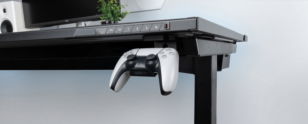 Glistco Vertical Stealth Mount holding a PS5 under a Secretlab MAGNUS desk